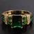 Anillo dorado de imitación de esmeralda con pedrería - comprar online