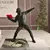 Imagem do Estátua Mesa Banksy