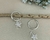 Argola de Click Dois Em Um com Estrela Cravejada Pendurada
