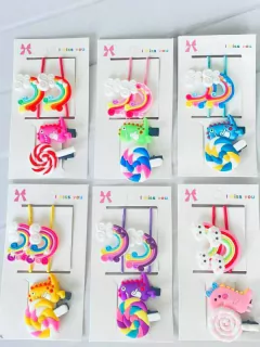 Set pinza con moñas dinosaurio