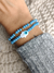 Pulsera de cristales y oro laminado celeste