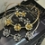 Conjunto Choker Aro e Brinco - Três Flores - comprar online
