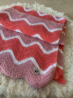 Pie de cama tonos rosas