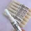 Corrector de ojeras con aplicador ushas