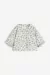 Chaqueta acolchada Floral H&M. C2017