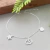 Pulseira de prata elo cartier com pingentes