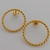 Brinco Argola Torcida Fechada 27mm - Banhado a Ouro 18k - comprar online