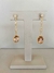 Brinco Insp. Carla Amorim c/ zirc.+zirconias ambar - comprar online