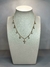 Colar cruz+rodas de cristais Insp. Carla Amorim - comprar online