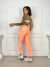 Conjunto top e calça color pocket - Pêssego com verde na internet