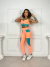 Conjunto top e calça color pocket - Pêssego com verde - UNNA FITNESS