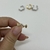 Piercing fake zigzag com zircônias na internet