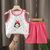 Conjunto de camiseta e shorts de a na internet