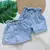 Short Saia jeans