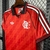 Camisa vermelha do Flamengo Lifestyler 2024, edição especial masculina, com detalhes em branco e listras nas mangas.