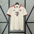 Camisa de torcedor masculina do Bayern de Munique na cor bege, modelo 3 24/25, com detalhes em vermelho e emblema do clube.