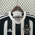 Camisa Atlético Mineiro Home 24/25 da Adidas, em preto e branco, exibindo detalhes como o logo do clube e as três listras características da marca.