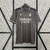 Camisa cinza do Real Madrid III 24/25 para torcedores masculinos, com detalhes em preto e logo da equipe.