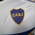 Emblema da camisa do Boca Juniors 2 24/25, destacando as estrelas e a sigla CABJ.