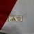 Etiqueta do produto oficial da camisa do River Plate, destacando a autenticidade do produto da Adidas.