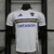 Camisa do Boca Juniors 2024/2025, branca com detalhes em azul e amarelo, estampada com o logo do clube e o nome "betsson".