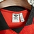 Etiqueta da camisa Flamengo Lifestyler 2024, mostrando a marca Adidas e informações de fabricação.