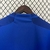 Detalhe das costas da camisa Cruzeiro Home 24/25, cor azul royal, com foco na gola e nos ombros.