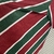 Camisa Fluminense masculina com as cores tricolores vermelho, verde e branco, em destaque.