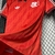 Camisa Flamengo Lifestyler 2024 masculina na cor vermelha, com detalhes em preto e branco, incluindo o logo do Flamengo e da Adidas.