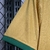 Detalhe da manga da camisa Palmeiras III 24/25, em tom amarelo com acabamento verde.