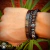Set 3 pzas. Pulsera y brazaletes tema jaguar con zirconias, cuentas de hematita y piedra ojo de tigre. (negro/humo) - IMPERIAL MONKEY JOYERIA