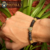 Pulsera cabezas de jaguar con zirconias y piedra ojo de tigre y baño de oro de 18k (negro/dorado) - (copia) - online store
