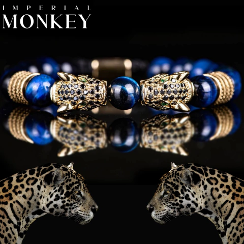 Pulsera cabezas de jaguar con zirconias y piedra ojo de tigre y baño de oro de 18k (azul/dorado)