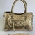bolsa-de-couro-legitimo-dourada