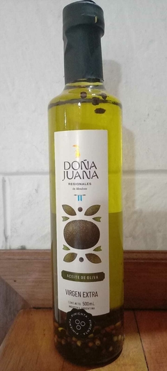 Aceite de oliva virgen extra. Condimentado con granos de pimienta