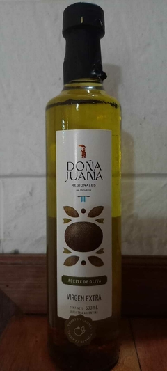 Aceite de oliva virgen extra. Condimentado con tomate seco y laurel