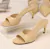 TAMANCO MULE CURVE HEELS VERNIZ CROCO NUDE SCHUTZ