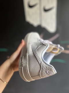 Zapatillas Nike F1 Blancas con aplique en internet