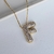 Colar letra F Cravajado com Micro Zircônias Banhado no Ouro 18K