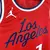 Camisa masculina dos Los Angeles Clippers, edição Statement 2024/25, na cor vermelha, com detalhes em azul e logo da Jordan.