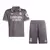 Kit infantil do Real Madrid I Adidas 23/24 na cor branca, composto por camisa e shorts.