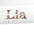 Imagem do Kit 2 Fraldas (1 Bordada + 1 Est.) - Letra Floral e Magenta