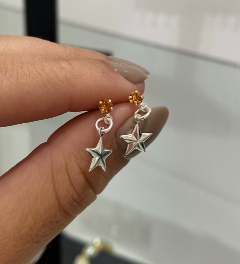 Abridor colgante Estrella amarilla bañado en plata