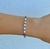 PU00122 Pulsera cristal azul marino y blanco con perlas