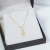 Pingente Cruz mini frente e verso, Ouro 18k