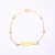 Pulseira infantil com placa oval e bolinhas, Ouro18k.