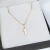 Pingente Cruz pequena, Ouro 18k