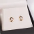 Brinco Gota cravejada com borda, Ouro 18k com brilhantes