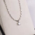 Gargantilha ponto de luz com detalhes cravejados, Prata 925 e Moissanite
