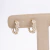 Argola flor, Ouro18k com brilhantes.